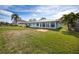 Lush backyard featuring a well-kept lawn and serene views at 3290 Sunset N Dr, St Petersburg, FL 33710