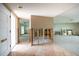 Spacious interior, ready to be remodeled, featuring tile flooring, exposed framing, and an open floor plan at 3290 Sunset N Dr, St Petersburg, FL 33710