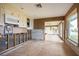 Bright kitchen area with cabinets and tile flooring in need of renovation at 3290 Sunset N Dr, St Petersburg, FL 33710
