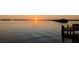 Sunset over a pier on the water at 3290 Sunset N Dr, St Petersburg, FL 33710