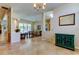 Spacious entryway with tile floors leading to the living room and other areas of the home at 3353 Wedgewood Way, Tarpon Springs, FL 34688