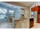Bright kitchen with a center island, stainless steel appliances, and a breakfast nook at 3353 Wedgewood Way, Tarpon Springs, FL 34688