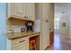 Cozy kitchen nook featuring custom cabinets and granite countertop at 3353 Wedgewood Way, Tarpon Springs, FL 34688