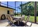 Relax and enjoy the beautiful outdoors with this covered patio dining set at 3353 Wedgewood Way, Tarpon Springs, FL 34688