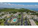 An aerial shot highlights the well-maintained condo community and its proximity to the scenic waterfront at 345 S Mcmullen Booth Rd # 142, Clearwater, FL 33759