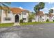 Exterior of building with parking spots and grass at 345 S Mcmullen Booth Rd # 142, Clearwater, FL 33759
