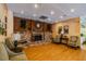 Comfortable common area with brick fireplace, wood accents, and cozy seating at 345 S Mcmullen Booth Rd # 142, Clearwater, FL 33759