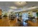 Spacious common area with multiple tables, chairs, and ample natural light at 345 S Mcmullen Booth Rd # 142, Clearwater, FL 33759