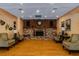 Comfortable common area with brick fireplace, wood accents, and cozy seating at 345 S Mcmullen Booth Rd # 142, Clearwater, FL 33759
