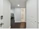 Hallway with dark wood floors leading to bedroom and bathroom at 345 S Mcmullen Booth Rd # 142, Clearwater, FL 33759