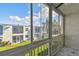 Screened patio with views of the building and community at 345 S Mcmullen Booth Rd # 142, Clearwater, FL 33759