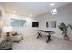 Finished basement with pool table, neutral carpet, and recessed lighting at 35 Deerpath Dr, Oldsmar, FL 34677