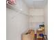 Spacious walk-in closet with metal shelving for ample storage at 4014 Dream Oak Pl # 202, Tampa, FL 33613