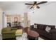 Living room showcasing an open design with views into the dining area and kitchen at 4014 Dream Oak Pl # 202, Tampa, FL 33613