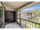 View from the patio that shows the exterior of the home, with bench seating and storage closet at 4014 Dream Oak Pl # 202, Tampa, FL 33613