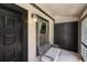 Covered porch with a bench, storage and a window, offering a cozy and functional outdoor space at 4014 Dream Oak Pl # 202, Tampa, FL 33613