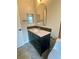 Bathroom featuring a modern vanity, a white countertop, and a decorative backsplash at 4639 Cabbage Palm Dr, Valrico, FL 33596