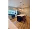 Well-lit kitchen with a central island, stainless steel appliances, and stylish pendant lighting at 4639 Cabbage Palm Dr, Valrico, FL 33596