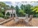Charming backyard deck with a gazebo and lush landscaping at 516 7Th Se St, Largo, FL 33771