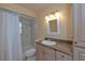 Full bathroom features an updated vanity and a shower/tub combo with a shower curtain at 516 7Th Se St, Largo, FL 33771