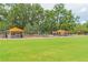 Expansive green space at the community park with picnic tables and playground equipment, perfect for outdoor recreation at 516 7Th Se St, Largo, FL 33771