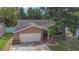 Charming single-Gathering home with a two-car garage, landscaped front yard, and inviting curb appeal at 516 7Th Se St, Largo, FL 33771