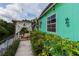 Exterior shot of building with covered patio and water views at 516 7Th Se St, Largo, FL 33771