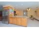 Open floor plan connecting the kitchen, living and dining areas provides a spacious atmosphere at 516 7Th Se St, Largo, FL 33771