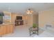 Well-lit living area boasts tile floors, and an open layout that connects to the kitchen and dining space at 516 7Th Se St, Largo, FL 33771