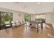 Recreation area featuring a ping pong table, large windows and comfortable seating at 5430 Eagles Point Cir # 202, Sarasota, FL 34231