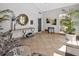 Spacious lobby with neutral color scheme, tasteful decor, and natural light at 5430 Eagles Point Cir # 202, Sarasota, FL 34231
