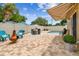 Spacious backyard featuring a brick patio with seating, a pool, and a fenced perimeter for privacy and enjoyment at 5726 20Th N Ave, St Petersburg, FL 33710