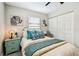 Comfortable bedroom featuring stylish animal-themed artwork and a neutral color palette for a relaxing ambiance at 5726 20Th N Ave, St Petersburg, FL 33710