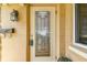 Elegant front door with glass inserts and classic exterior lighting at 5726 20Th N Ave, St Petersburg, FL 33710