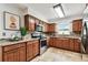 Well-appointed kitchen featuring granite countertops and stainless steel appliances at 5726 20Th N Ave, St Petersburg, FL 33710