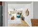 Inviting living room with a stylish rug, comfortable seating, and sliding glass doors to the outdoor patio at 5726 20Th N Ave, St Petersburg, FL 33710