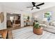 Cozy living room featuring stylish furnishings and easy access to the dining area and outdoor spaces at 5726 20Th N Ave, St Petersburg, FL 33710