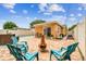 Enjoy the outdoor patio with seating area, pool, and sunny skies at 5726 20Th N Ave, St Petersburg, FL 33710