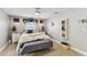 Serene bedroom featuring a cozy bed, warm lighting, and stylish decor, creating a peaceful retreat at 5744 Thrush Dr, New Port Richey, FL 34652