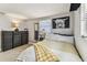 Cozy bedroom with carpet flooring, a cow painting and lots of natural light at 5744 Thrush Dr, New Port Richey, FL 34652