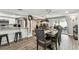 Open concept kitchen and dining space with modern furnishings, perfect for entertaining at 5744 Thrush Dr, New Port Richey, FL 34652