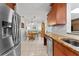Updated kitchen with stainless steel appliances, granite counters, and an open layout at 6289 107Th N Ave, Pinellas Park, FL 33782