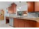 The kitchen showcases granite counters, stainless steel appliances, and updated cabinets at 6289 107Th N Ave, Pinellas Park, FL 33782