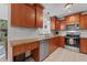 Efficient kitchen featuring stainless steel appliances, granite counters, and ample cabinet space at 6289 107Th N Ave, Pinellas Park, FL 33782