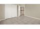 Large bedroom featuring closet and tile flooring at 6439 Gentle Ben Cir, Wesley Chapel, FL 33544