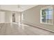 Large bedroom featuring lots of natural light and tile flooring at 6439 Gentle Ben Cir, Wesley Chapel, FL 33544