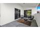 Cozy outdoor patio with chairs and privacy at 6439 Gentle Ben Cir, Wesley Chapel, FL 33544