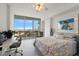 Bright bedroom featuring a large window with city views, modern decor, and comfortable furnishings at 777 3Rd N Ave # 1304, St Petersburg, FL 33701