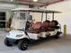 Community golf cart with leather seats and easy access to building entrance at 777 3Rd N Ave # 1304, St Petersburg, FL 33701