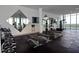 Bright gym featuring free weights, weight machines, and floor-to-ceiling windows with city views at 777 3Rd N Ave # 1304, St Petersburg, FL 33701